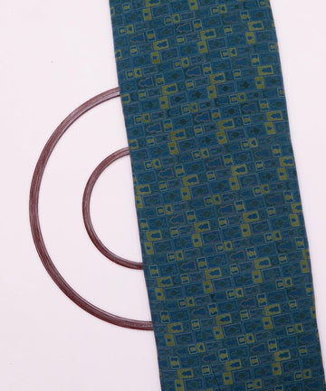 teal and green object print rayon fabric